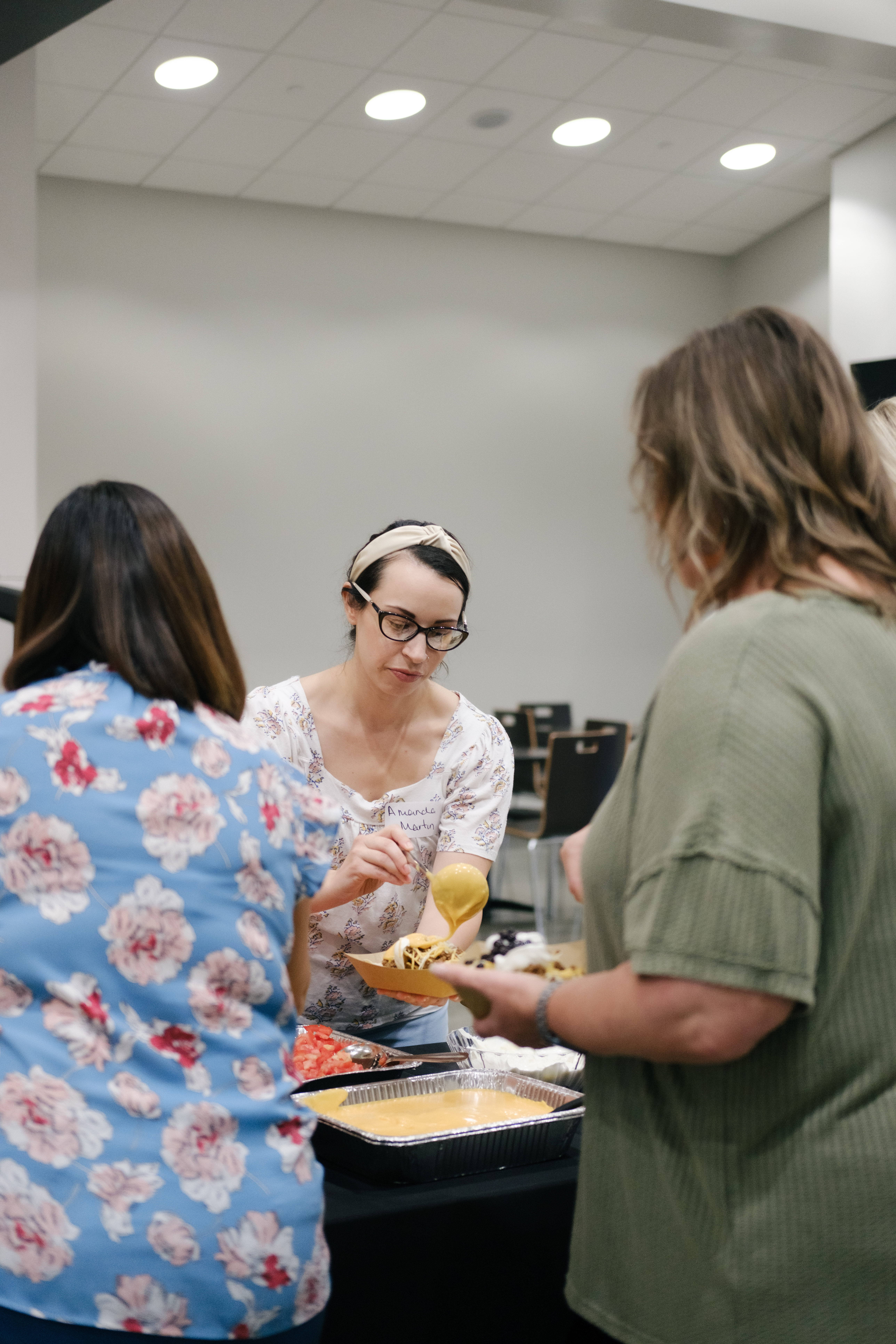 Volunteer helping with food distribution.