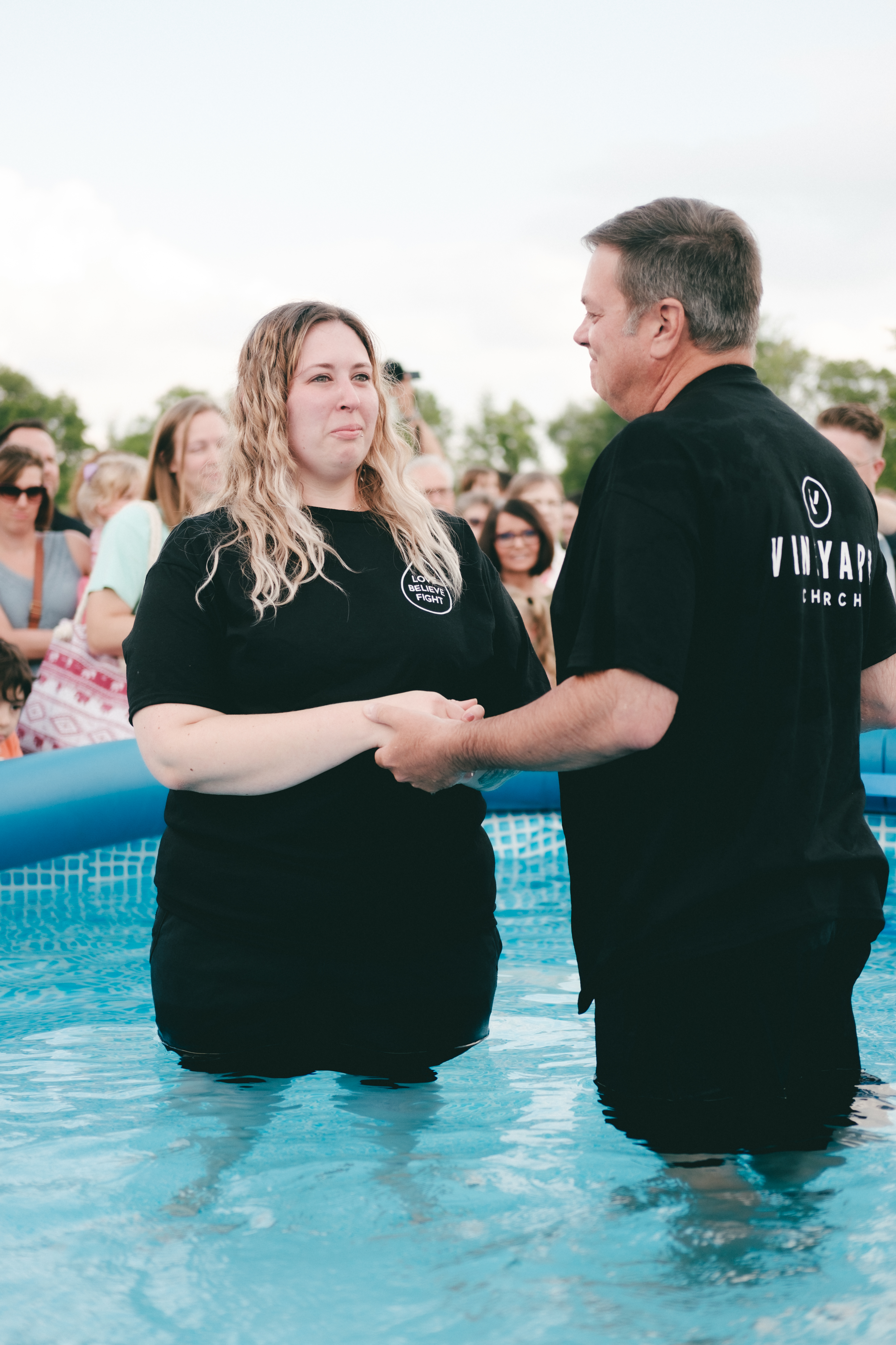 Adult being baptized by VCKC pastor.