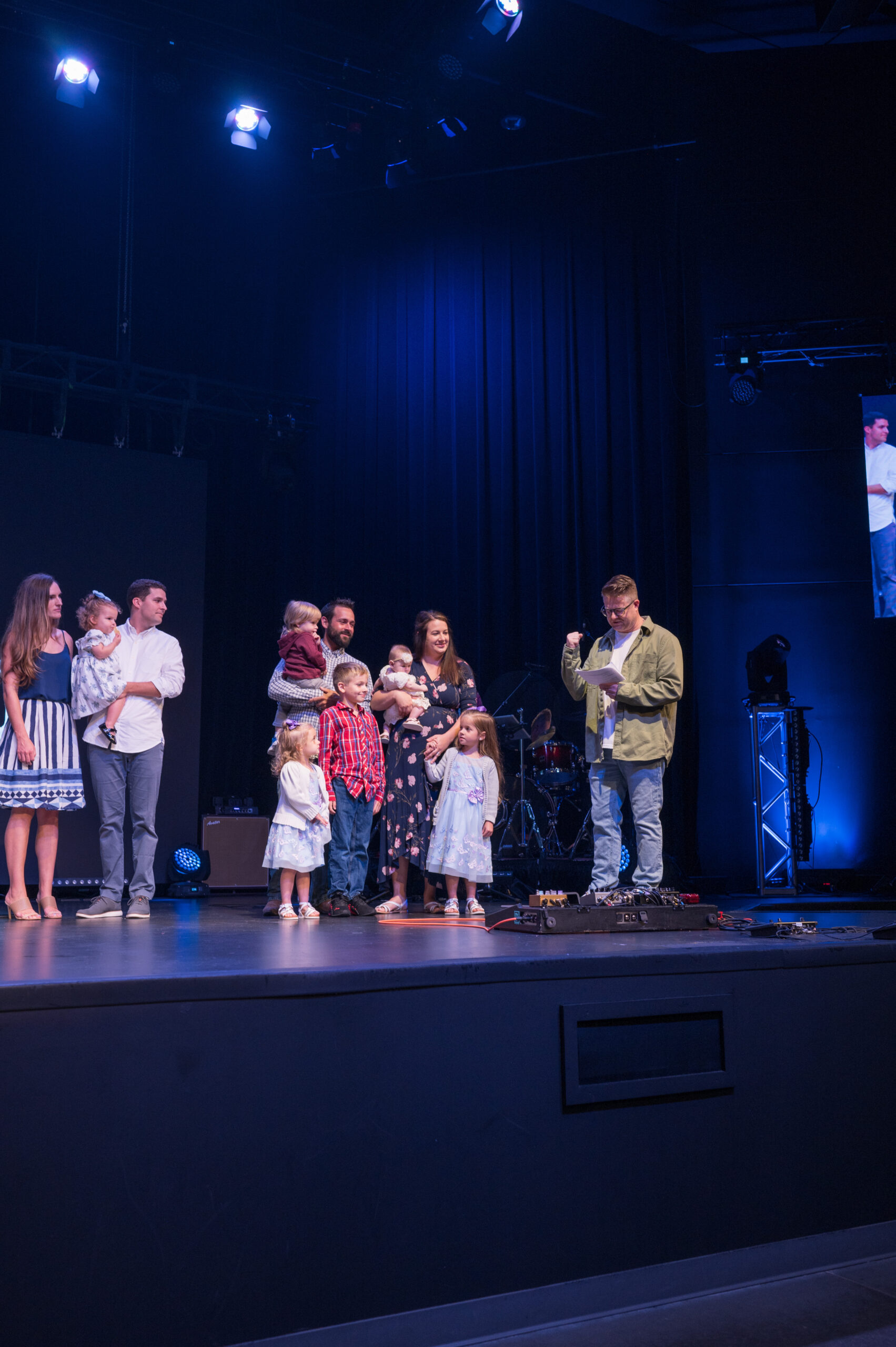 Children being dedicated to the church by Pastor Greg.